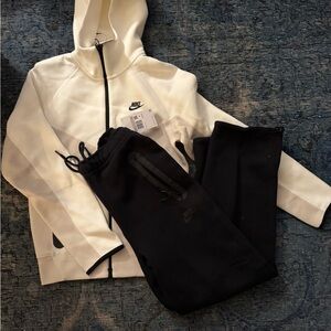 Nike Tech Cream and Black Zip-Up Jacket and Black tech pants